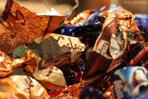 Inspector reviewing waste containers in a municipal lane